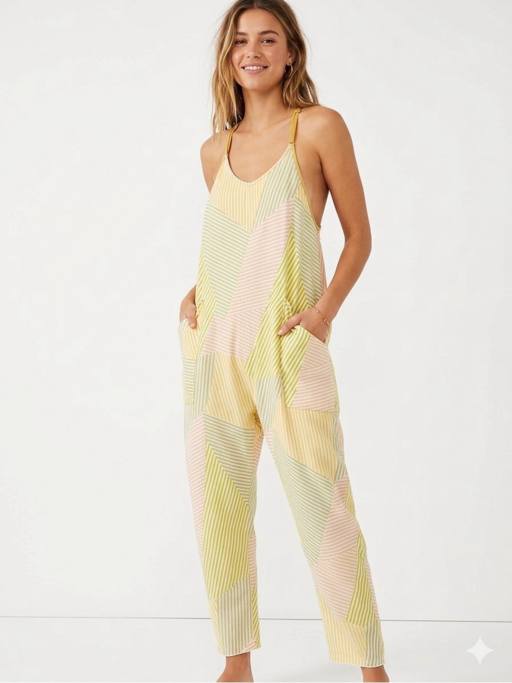 Free People FP Movement Hot Shot Printed Strappy Jumpsuit Size S Melon Romper